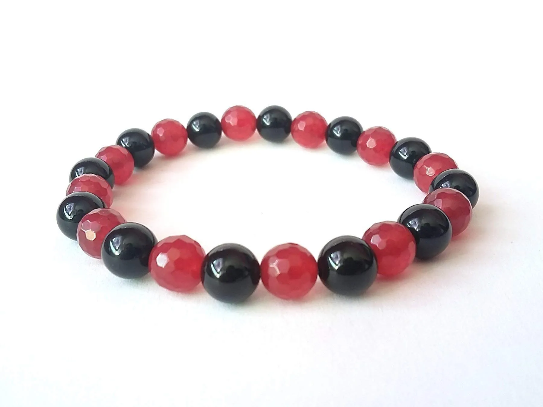 Bracciale Energia Vitale: Onice Nera e Giada Rubino, Armonia Naturale al Polso